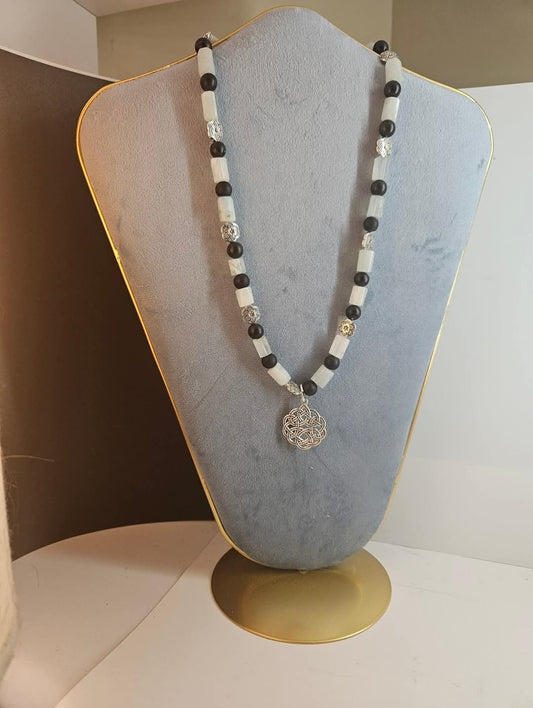 Aquamarine, onyx, celtic charm, oval toggle clasp.